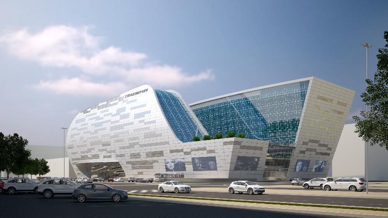 Steigenberger Hotel Ad Dawhah Esterno foto The image shows a modern architectural building with a futuristic design. The structure features large glass windows and a dynamic, flowing shape, combining different materials like metal and stone. There are green areas on the roof, and several scre